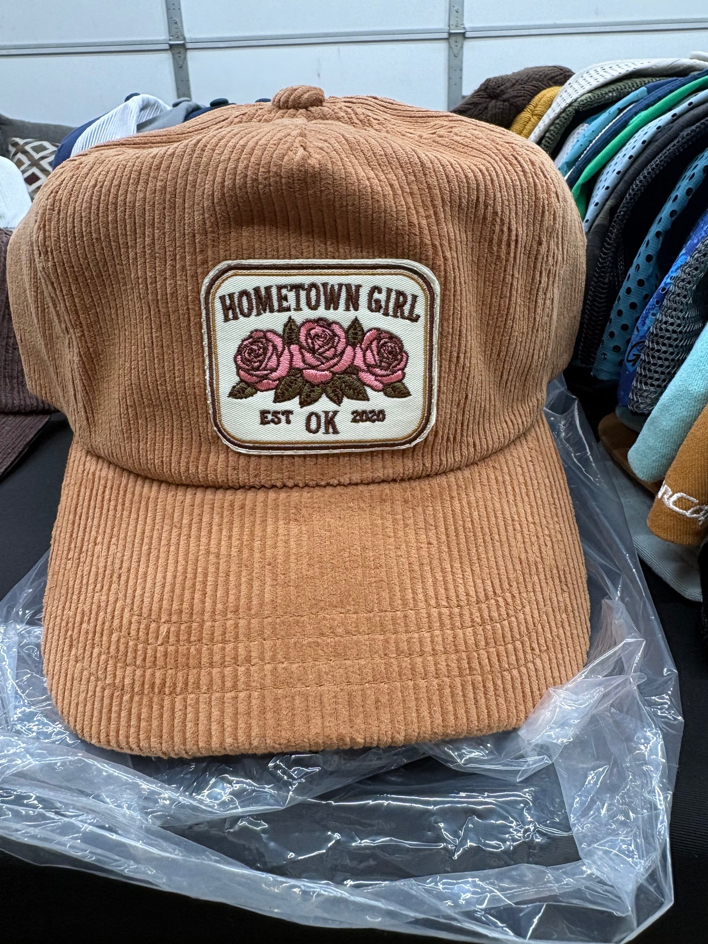 Brown corduroy cap with 'Hometown Girl' patch