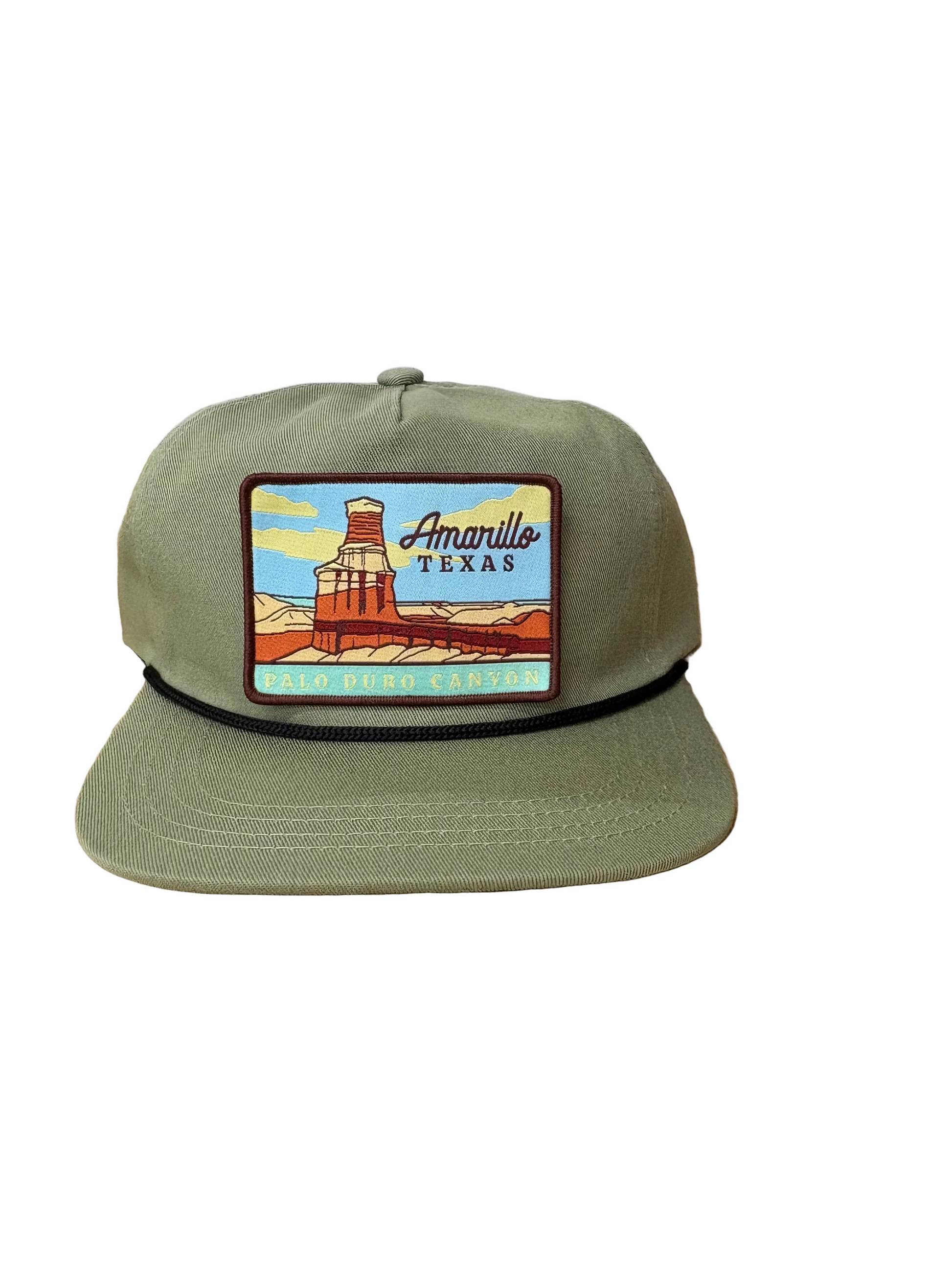 Sage cap with a colorful patch featuring Amanillo, Texas on a white background. Patch isn't sewn on in picture. Product use only.