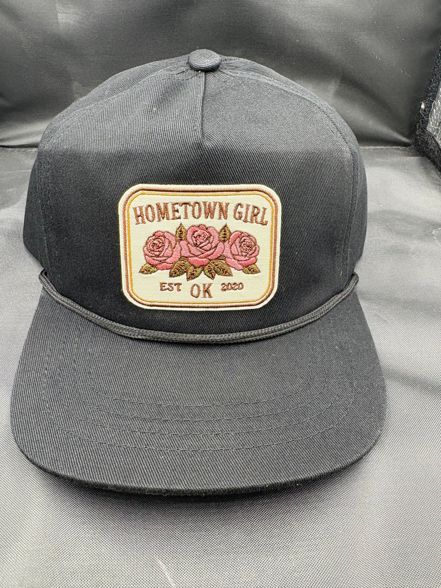 Black kids hat with 'Hometown Girl' patch featuring roses