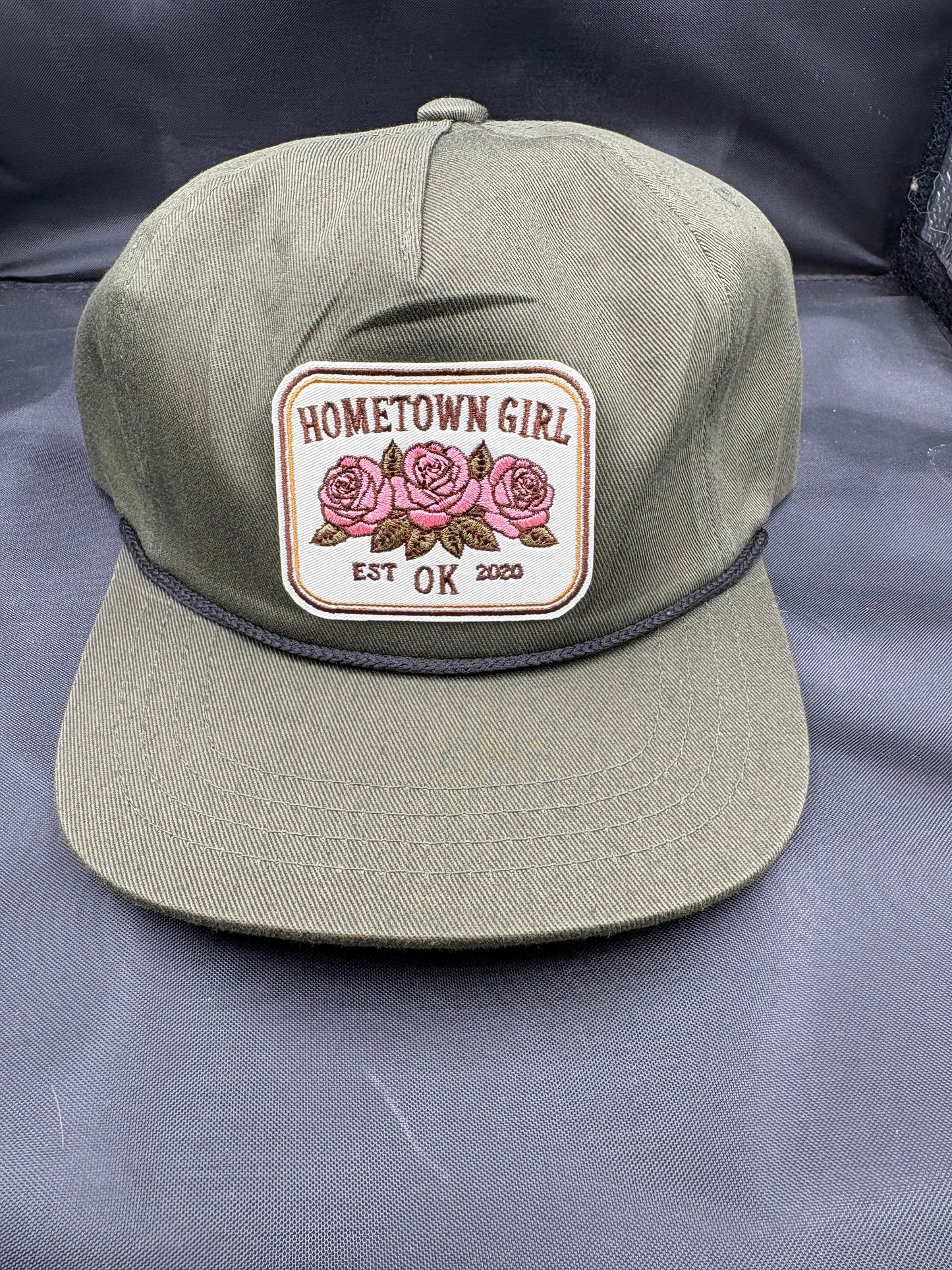 Olive kids hat with 'Hometown Girl' patch featuring roses 